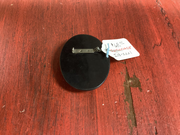 Black Oval Bakelite Cameo Brooch