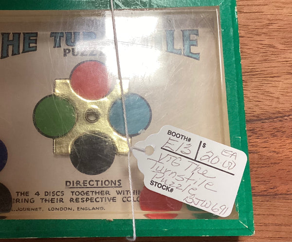 The Turnstile Puzzle Game by R. Journet & Co.