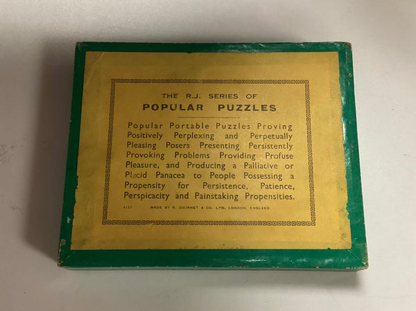 The Turnstile Puzzle Game by R. Journet & Co.