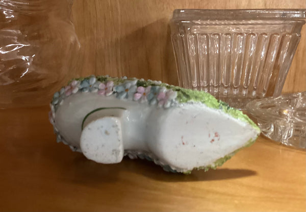 Bisque Figural Lady in a Shoe Pin Cushion