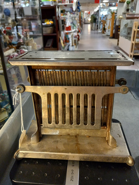 Antique "Universal" Toaster with cord made by Landers, Frary, & Clark