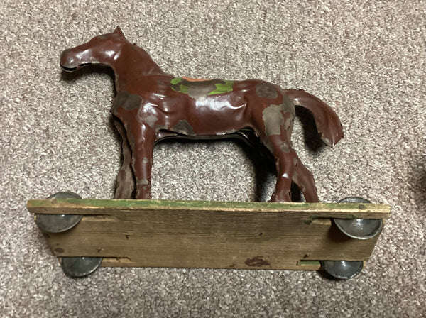 Circa 1890's Toy Tin Horse On Rolling Platform