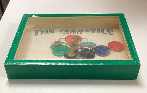 The Turnstile Puzzle Game by R. Journet & Co.
