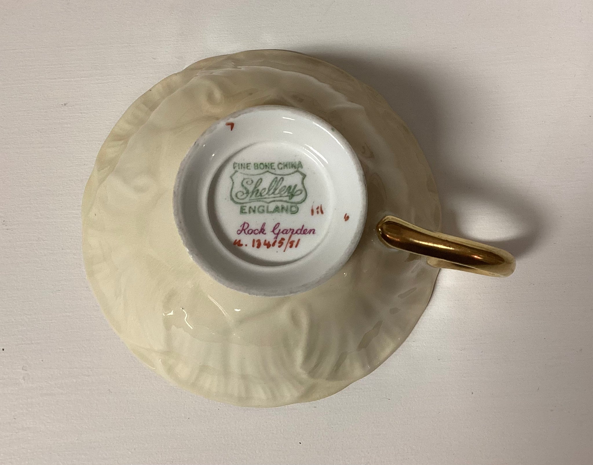 VINTAGE Shelley sold Bone China Rock Garden Golden Handle Tea Cup and Saucer, England